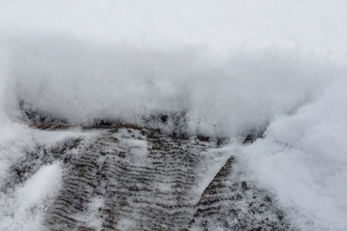 An inch or two of new snow in the upper elevations.