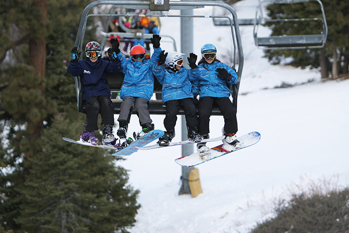 Members of Team Mountain High spend a happy Christmas Eve on the slopes.