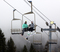 All smiles going up the chair lift.