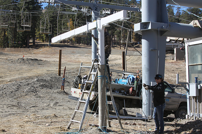 New gates being installed for quicker lift lines.