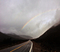 Rainy rainbow over Lone Pine Canyon Road.