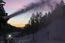 Blasting out snow as the sun lights up the horizon