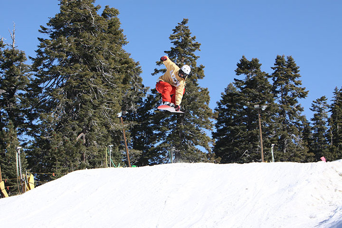 Catching some air on Lower Chisolm.