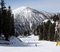 Fresh snow covers the local mountains.