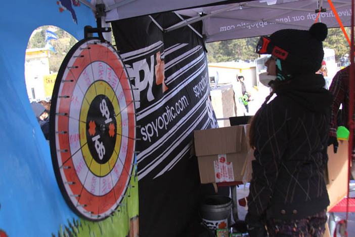 Taking her turn spinning the Spy Optics prize wheel.