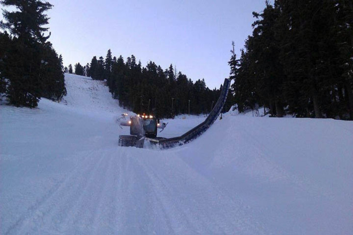 The new Zaugg in action fixing up the side of the new jump on Lower Chisolm!