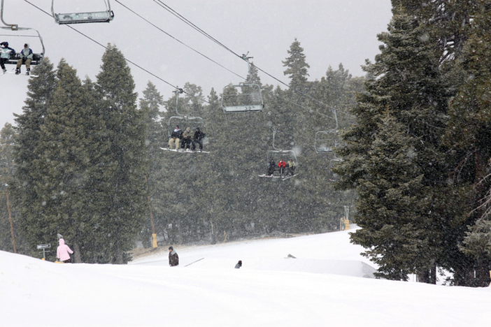 Fresh snow continues to fall.