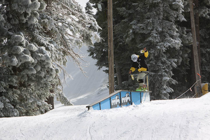 Light snow lines the trees behind the A Frame Rail on Borderline.