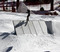 Sliding the coping of the Playground Wallride.