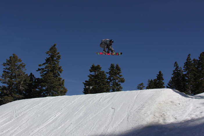 Soaring over the last table on Pipeline.