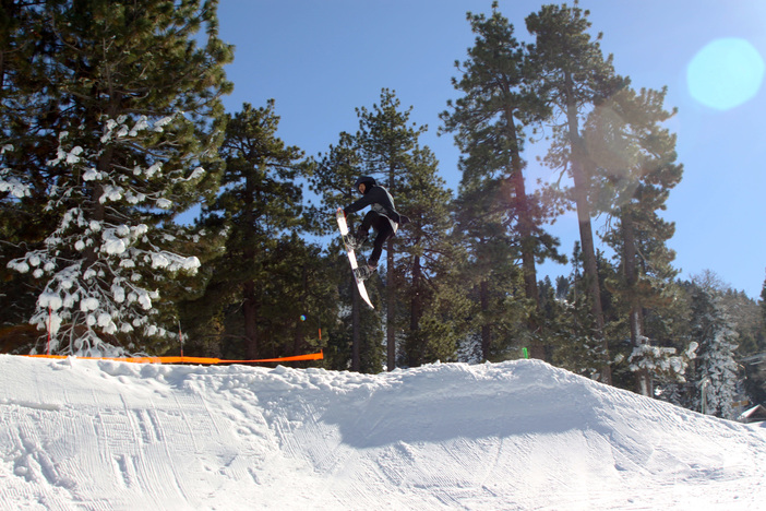 Khunie with the seatbelt grab on the new jump on creekside.