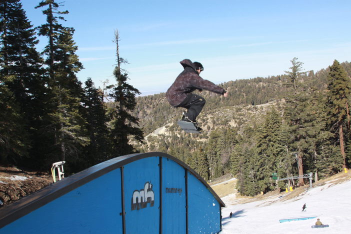 Launching off the Rainbow Rail on Lower Chisolm.