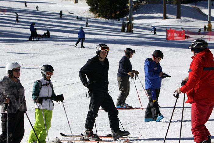 Getting some valuable tips from their winter Sports school instructor.