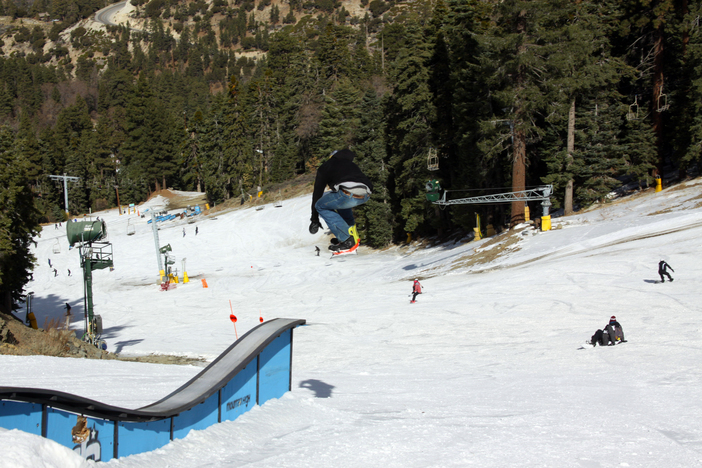 Catching air on lower chisolm.