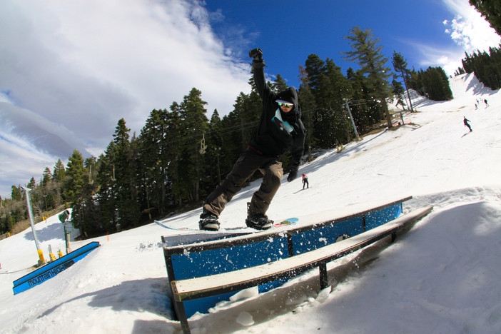 Pro Skateboarder @GregLutzka with the tail press on the picnic table.