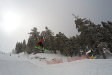 Catching air on the Lower Chisolm Jump