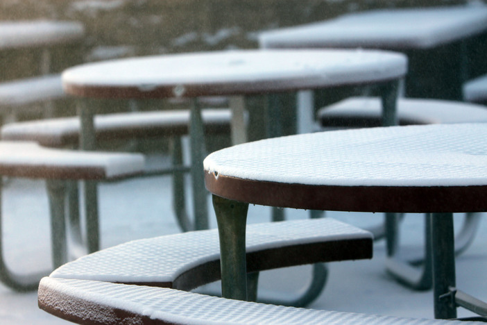 Fresh snow blankets the base area.